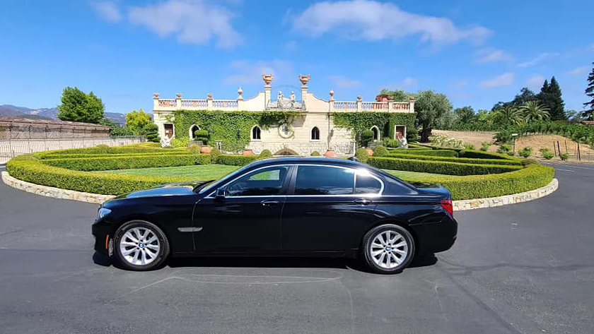 BMW750 car in front of a winery