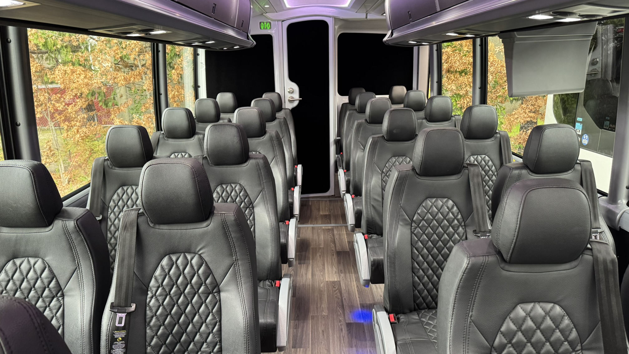 56 Passenger Motor Coach - MCI, Black Leather