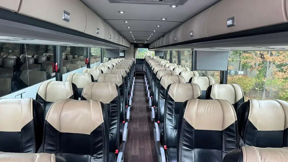 California Wine Tours bus interior with two-tone leather seats designed for long-distance group travel comfort