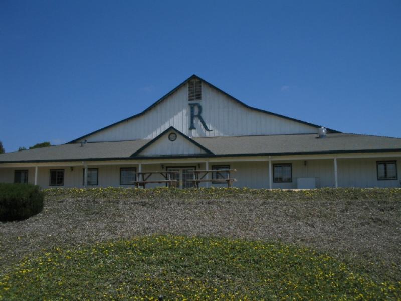 roche The Ranch at Rio del Mar features beautiful greenery and charming buildings, designed by Roche.