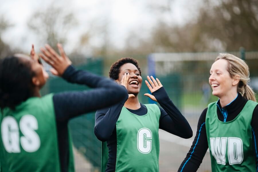 adult-female-netball-team-celebrating-win-on-netba-2024-10-18-09-49-11-utc student athletes playing sports