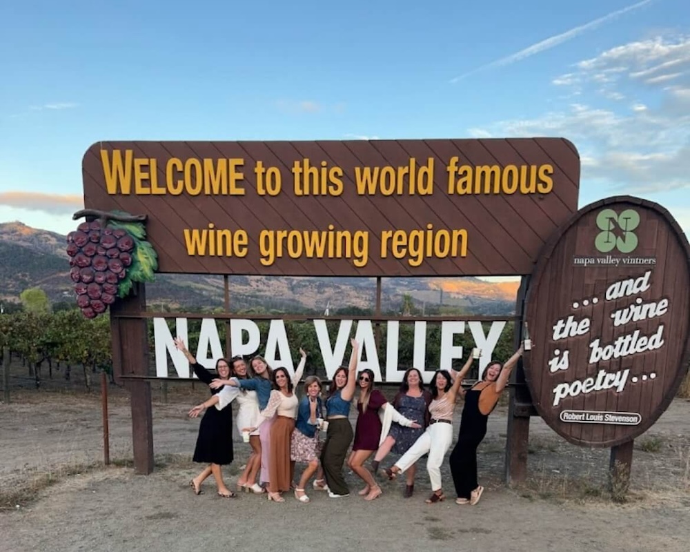 group-in-front-of-napa-sign copy group-in-front-of-napa-sign