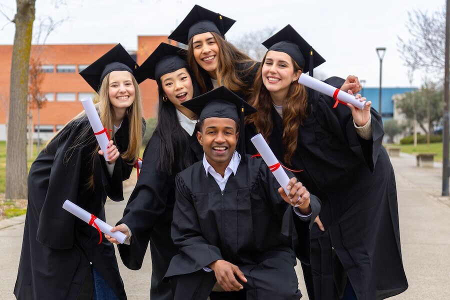 happy-multiethnic-students-celebrating-graduation-2025-03-05-05-10-23-utc student graduates