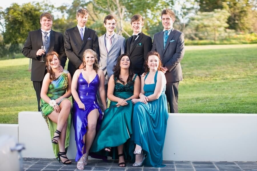 teenagers-in-formal-wear-posing-together-2025-04-03-04-23-03-utc students at prom dressed formal