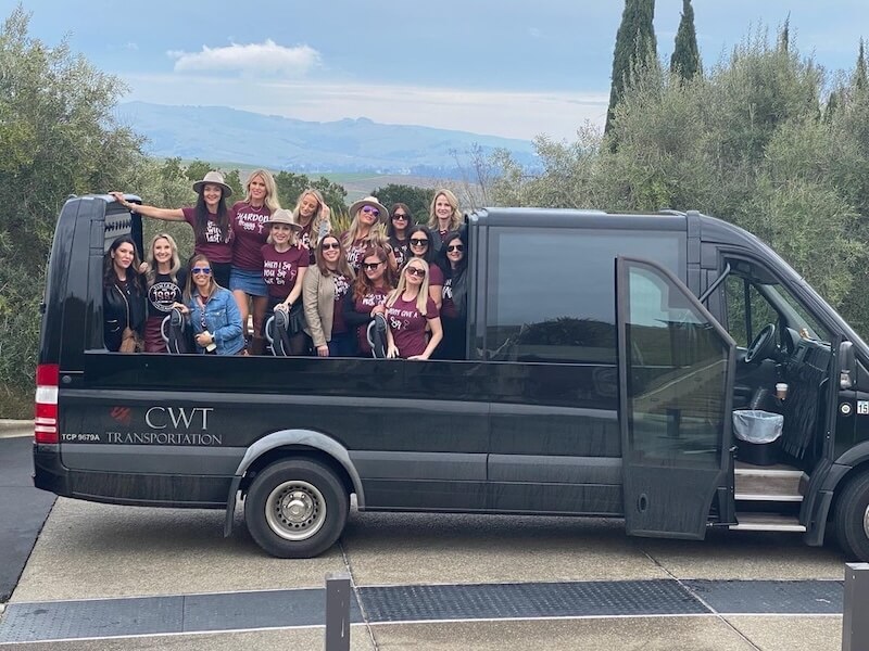 women-wine-country-tour-open-air group wine tour in a shuttle in wine country
